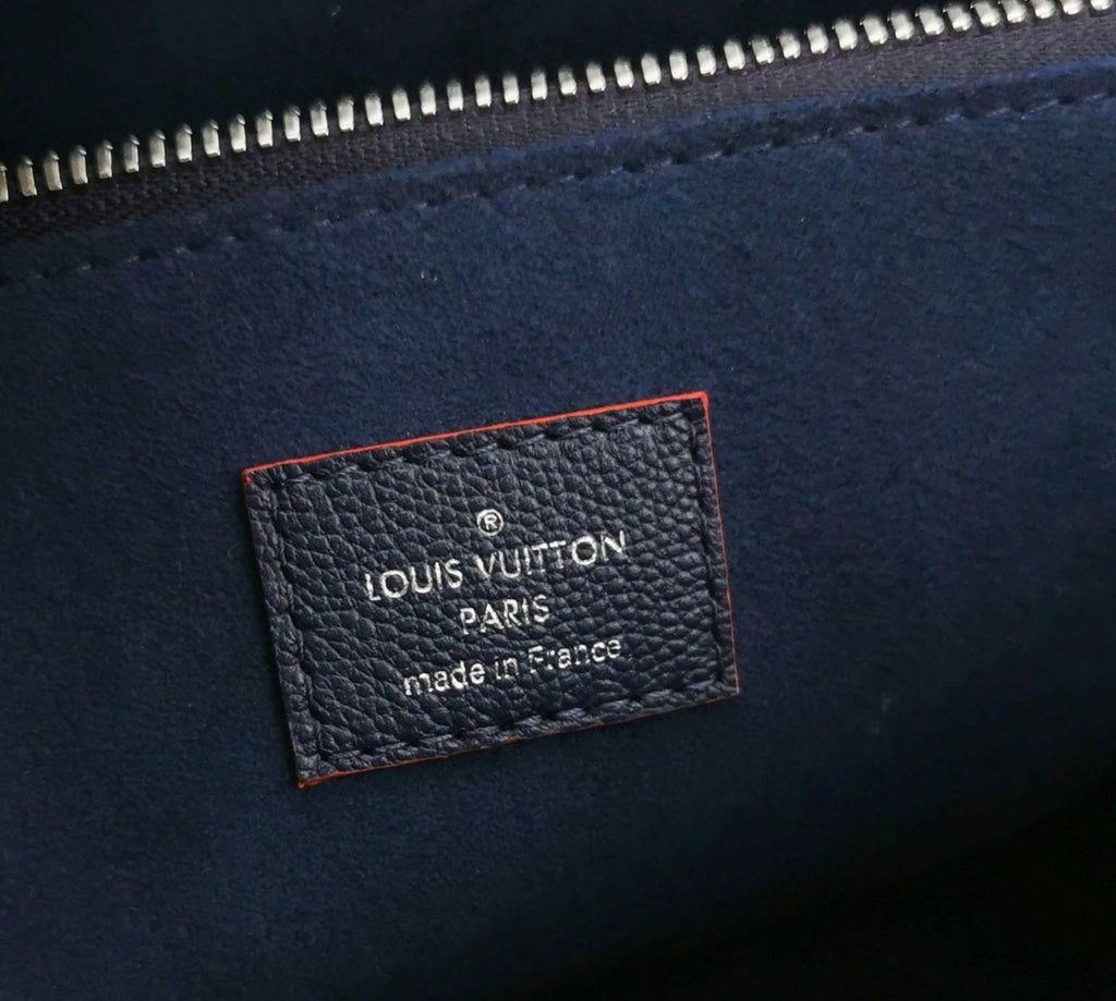 LOUIS VUITTON Epi Leather Twist Bag