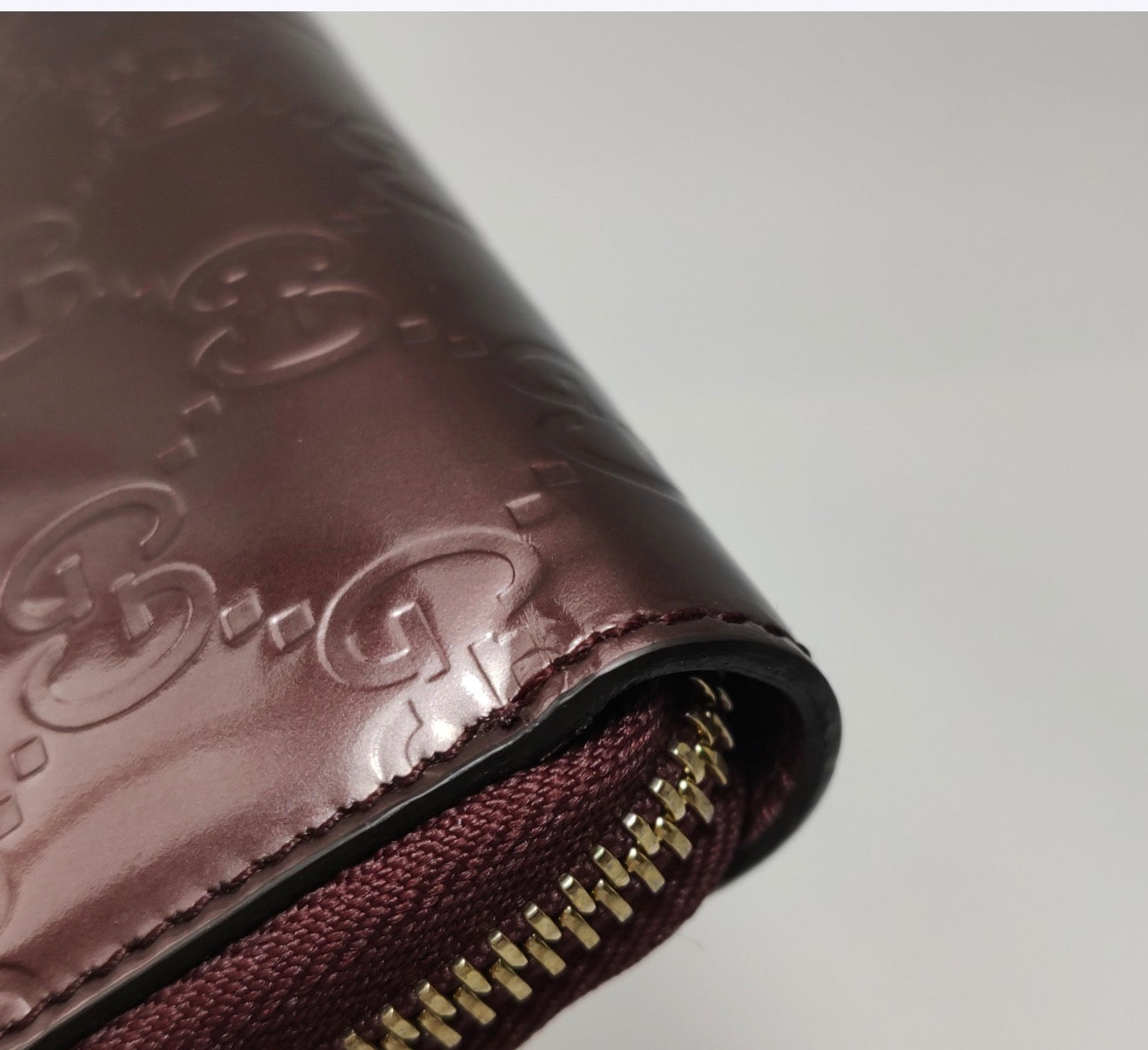 GUCCI Patent Guccissima Zip Around Long Wallet