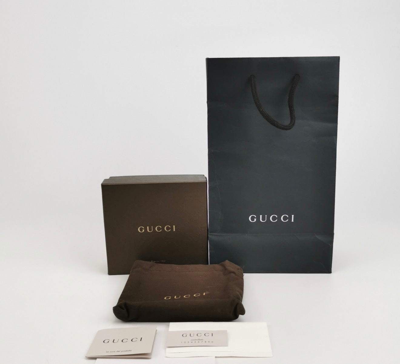 GUCCI Microguccissima Patent Leather Wallet